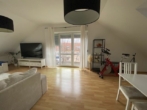 Wohnzimmer II - Gemüt­li­che 3‑Zimmer Woh­nung in ruhi­ger Wohn­ge­gend mit Balkon