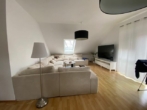 Wohnzimmer I - Gemüt­li­che 3‑Zimmer Woh­nung in ruhi­ger Wohn­ge­gend mit Balkon